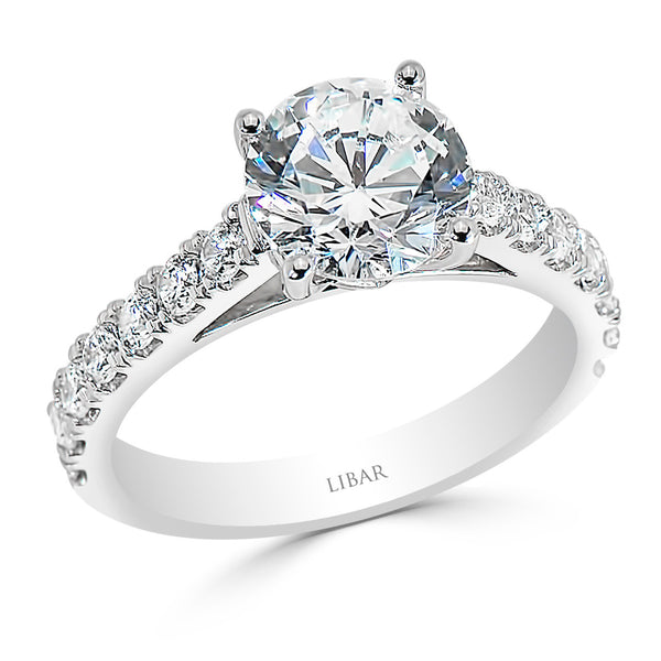 Ladies Four Claw Cathedral Style Pave Set Engagement Ring