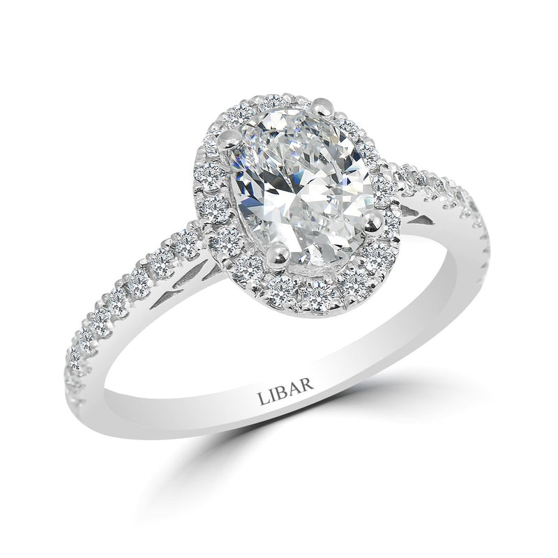 French Pavé Set Oval Halo Engagement Ring