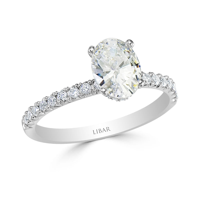 Four Claw Oval Diamond Hidden Halo Ladies Engagement Ring